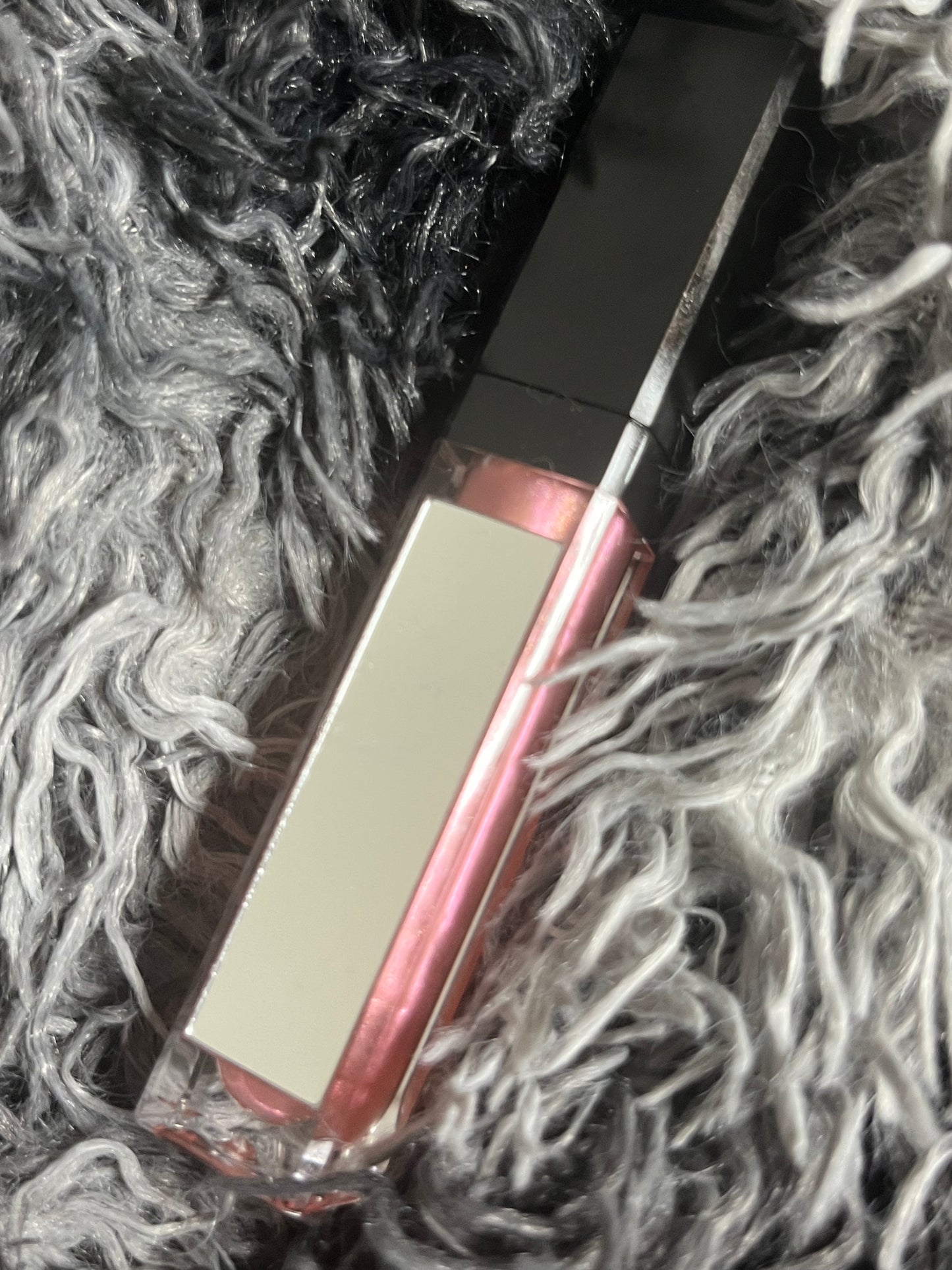 Pink gloss black container